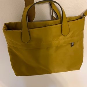 a new day mustard cross body bag/ mini backpack